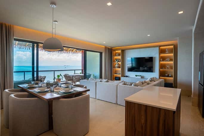 Ana y Jose Island Mujeres Condo fully equipped kitchen, dining area with wooden table, pendant lights, open concept